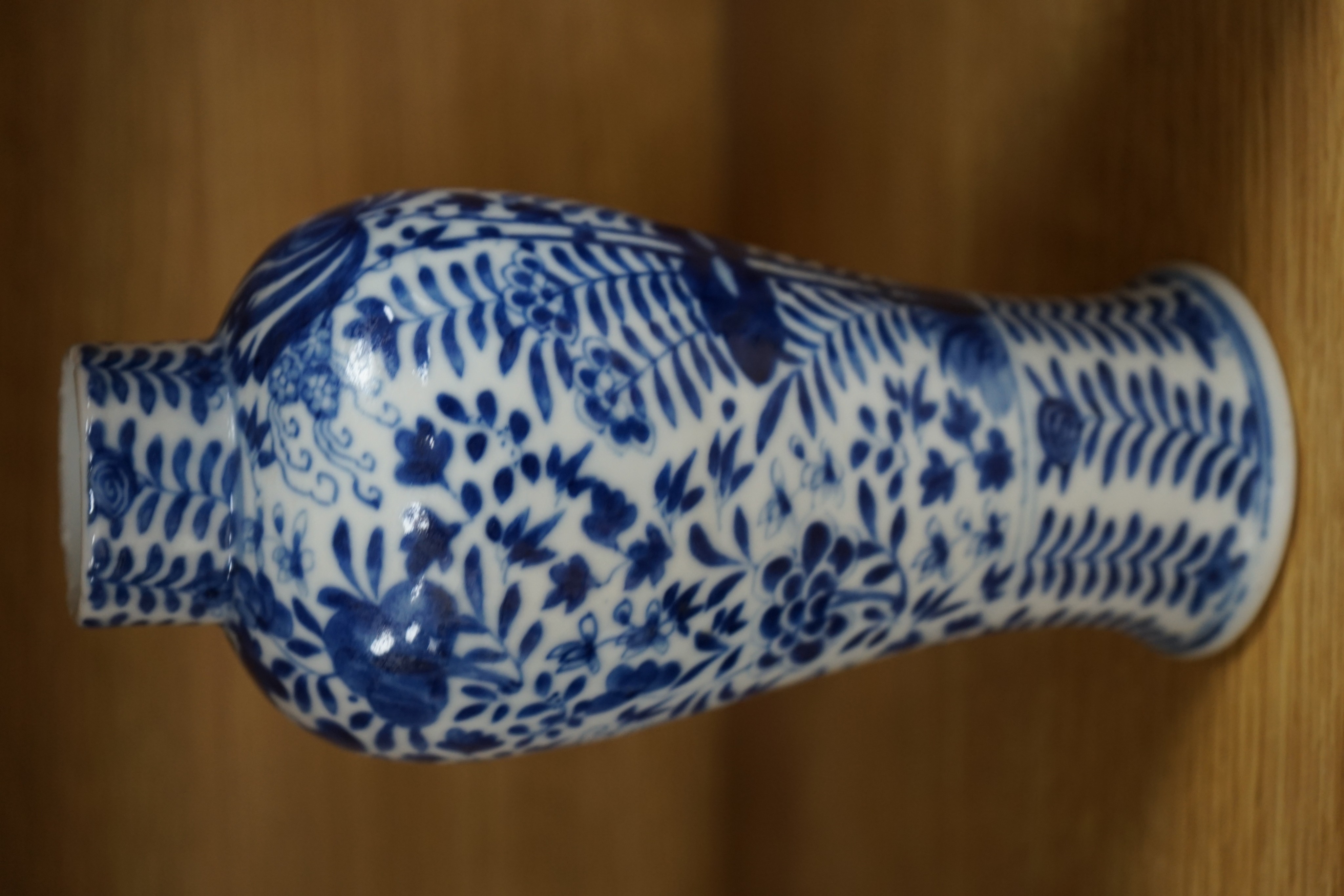 Two Chinese blue and white baluster vases, late 19th century and a Chinese sang de boeuf glazed vase, 27cm